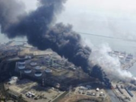 Черный дым над "Фукусимой-1". Фото с сайта www.itar-tass.com